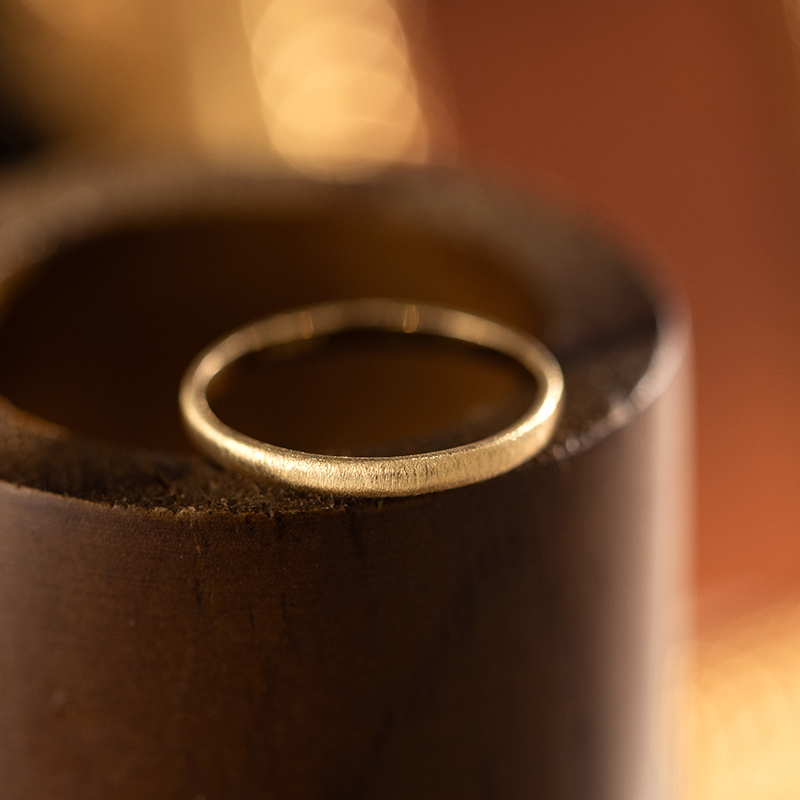 31536 Simple hammered finish plain ring band.