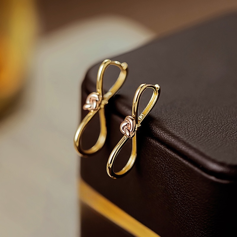 25115 Two-color rose gold twisted flower plain gold earrings  
